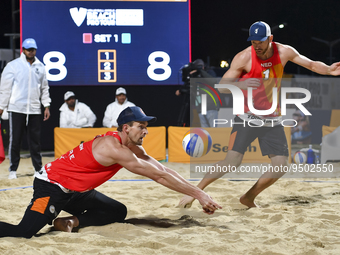 Alexander Brouwer (L) and Robert Meeuwsen (R) of Netherlands react during the men's Volleyball World Beach Pro Tour Finals against Paolo Nic...