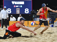 Alexander Brouwer (L) and Robert Meeuwsen (R) of Netherlands react during the men's Volleyball World Beach Pro Tour Finals against Paolo Nic...