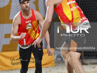 Alexander Brouwer (R) and Robert Meeuwsen (L) of Netherlands react during the men's Volleyball World Beach Pro Tour Finals against Paolo Nic...