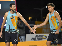  Paolo Nicolai (L) and Samuele Cottafava (R) of Italy action during the men's Volleyball World Beach Pro Tour Finals against Alexander Brouw...