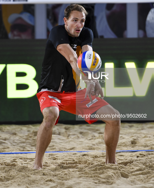 Ondrej Perusic of Czech Republic action during the men's Volleyball World Beach Pro Tour Finals against Anders Berntsen Mol (R) and Christia...