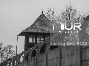(EDITOR'S NOTE: Image was converted to black and white) A watchtower and barb wired fence at the former Nazi German Auschwitz I concentratio...