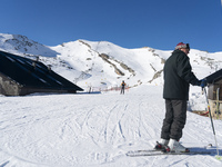 A skier rests after going down a slope in the ski and mountain resort of Alto Campoo or Branavieja, which is located in the municipality of...