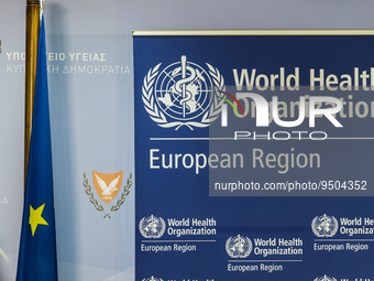 A WHO banner is seen in the room, Nicosia, Cyprus, on Jan. 27, 2023. The Signing of an Agreement between the Ministry of Health, represented...