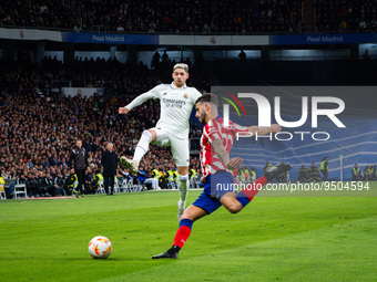 Mario Hermoso (Atletico Madrid) and Federico Valverde (Real Madrid) in action during the football match between
Real Madrid and Atletico Mad...