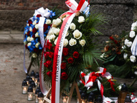 Wreaths lying ceremony in front of the Death Wallceremony in front of the Death Wall in the former Nazi German concentration and exterminati...