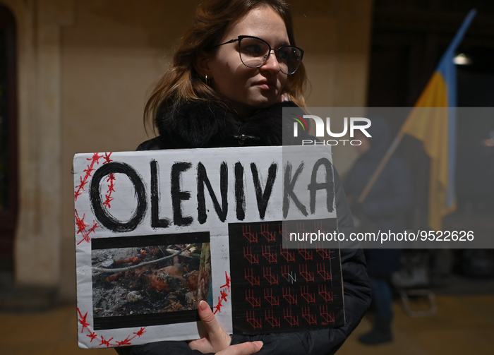 Ukrainian activist holds a poster with the name of Olenivka (The little town where 53 Ukrainian soldiers from the Azovstal complex and priso...