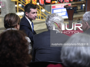 US Secretary of Transportation speaks with guests prior to US President Joe Biden's discussion about funding for the “Hudson Tunnel Project”...