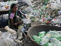 A women works at a plastic recycling factory near the Old Buriganga river channel in Dhaka , Bangladesh on February 01, 2023. Buriganga rive...