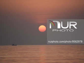 A sunset is seen near a sea beach in Mumbai, India, 08 February, 2023.  (