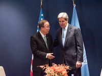 Secretary-General of the United Nations Ban ki-moon (left) and United States Secretary of State John Kerry (right) shaking hands on the fina...