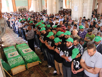 RAMALLAH, PALESTINE -April 30, 2014: Palestinians are performing the funeral prayers on the two Hamas members Adel and Imad Awadallah who wa...