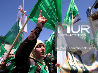 RAMALLAH, PALESTINE -April 30, 2014: Palestinian girl during the funeral of the two Hamas members Adel and Imad Awadallah who was reportedly...