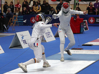 Camille Nabeth, from France, and Dorina Wimmer, from Hungary, during the 46th edition of the City of Barcelona International Fencing Trophy...