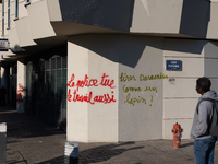 Demonstrators painted on the police station ''the police kill the work too, shoot Darmanin like a rabbit'' during a demonstration on the fou...