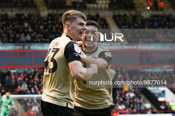 Ed Turns of Leyton (L) celebrates scoring their side's first goal of the game during the Sky Bet League 2 match between Walsall and Leyton O...