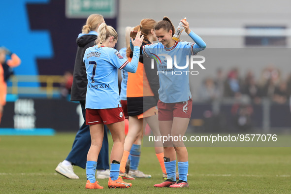 Manchester City players celebrate victory during the Barclays FA Women's Super League match between Manchester City and Arsenal at the Acade...