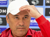 Ruzikul Berdiev, head coach of Uzbekistans FC Nasaf  attends the press conference ahead of the round of 16 match against Saudi Arabias Al-Sh...