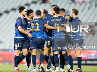 Trent Buhagiar of the Jets celebrates with teammates after scoring a goal during the round 17 A-League Men's match between Macarthur FC and...