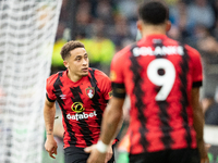 Marcus Tavernier of Bournemouth (L) celebrates scoring their side's first goal of the game during the Premier League match between Wolverham...