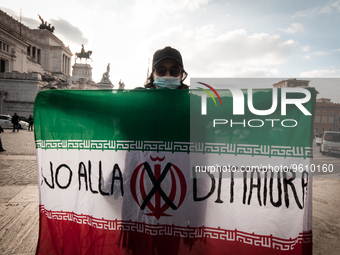 Flash mob in the centre of Rome in favor of democracy and freedom in Iran, with placards depicting people condemned by the Iranian regime on...