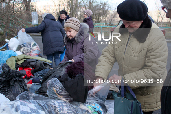 KHERSON, UKRAINE - FEBRUARY 21, 2023 - Residents of the Korabelnyi district of Kherson receive humanitarian aid from the members of the Volu...
