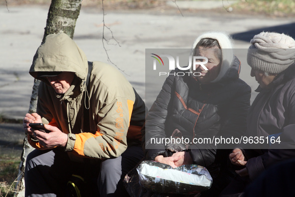 KHERSON, UKRAINE - FEBRUARY 21, 2023 - Residents of the Korabelny district of Kherson who have received humanitarian aid from members of the...