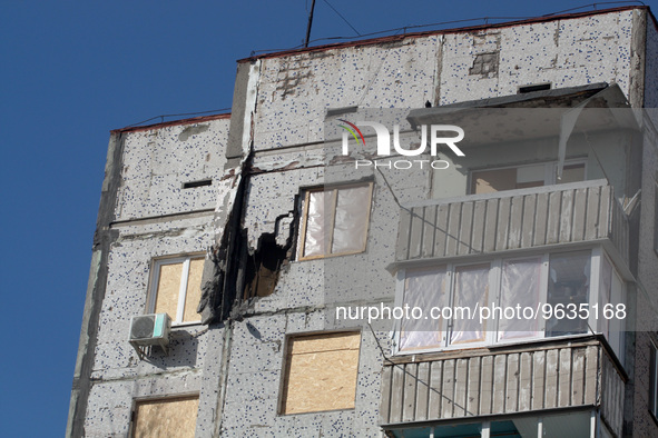 KHERSON, UKRAINE - FEBRUARY 21, 2023 - A building damaged as a result of shelling by the Russian army in the Korabelnyi district, Kherson, s...