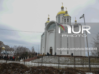 Residents of Bucha and relatives of people killed during the war in Ukraine leave the church of Andrew the First-Called after the prayer ser...