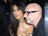 Kim Kardashian (L) and Domenico Dolce (R) are seen during the Dolce & Gabbana party at Milan Fashion Week Fall/Winter 2023/2024 in Milano, I...