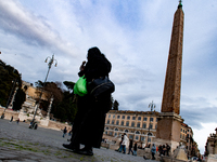 Tourists on March 2, 2023 in Rome in italy, walk in Piazza del Popolo  (
