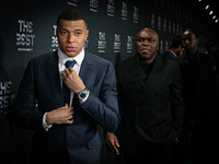 

Kylian Mbappe, French and PSG striker, is walking the Green Carpet ahead of The Best FIFA Football Awards 2022 on February 27, 2023 in Par...