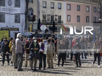 

People are seen walking around the historical area of Sintra, Portugal, on March 3rd, 2023, wearing protection masks. Sintra stands out fo...