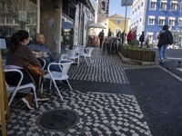 

People are seen relaxing in a restaurant in the historic area of Sintra, Portugal, on March 3rd, 2023. Sintra stands out for its Romanesqu...