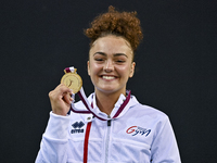 Gold medalist Coline Devillard of France poses during the awarding ceremony after the womens Vault final at the 15th FIG Artistic Gymnastics...