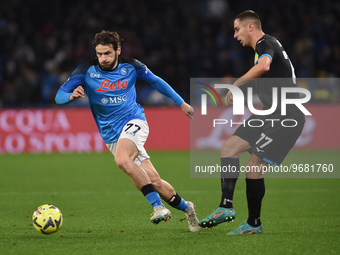 Adam Marusic of SS Lazio competes for the ball with Khvicha Kvaratskhelia of SSC Napoli during the Serie A TIM match between SSC Napoli and...