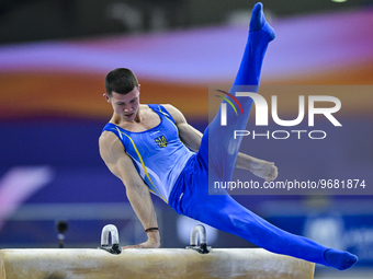 Illia Kovtun of Ukraine  competes during the men's pommel horse final at the 15th FIG Artistic Gymnastics World Cup in Doha, Qatar, on 03 Ma...