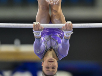  Yelyzaveta Hubareva of Ukraine competes during the women's uneven bars Final at the 15th FIG Artistic Gymnastics World Cup in Doha, Qatar,...