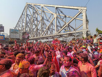 People are seen celebrating the festival of Holi  in Kolkata , India , on 5 march 2023 ,with colored powder called ''Abir'' . Holi , also kn...