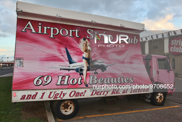 Vehicle billboard at the Airport Strip Club in Mississauga, Ontario, Canada. 