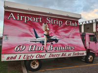 Vehicle billboard at the Airport Strip Club in Mississauga, Ontario, Canada. (