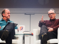 Bernhard Robben, a German literary moderator, speaks to Ian McEwan, an English novelist on the stage at Flora Hall during the Lit.cologne, t...
