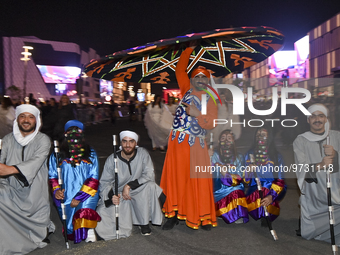 Artists perform global street art performances as part of the Darb Lusail Parade on the final day at Lusail Boulevard in Lusail City, Doha-Q...