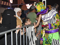 Artists perform global street art performances as part of the Darb Lusail Parade on the final day at Lusail Boulevard in Lusail City, Doha-Q...