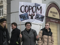 Students and teachers of the Kyiv Conservatory take part in a protest demanding the removal of the name of Russian composer Pyotr Tchaikovsk...