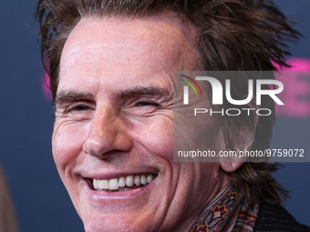 British musician John Taylor of English rock band Duran Duran arrives at The Women's Cancer Research Fund's An Unforgettable Evening Benefit...