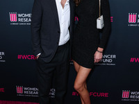 American actor, director and producer Paul Wesley and Natalie Kuckenburg arrive at The Women's Cancer Research Fund's An Unforgettable Eveni...