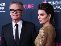 American actor, author and entrepreneur Harry Hamlin and wife/American actress, television personality and model Lisa Rinna arrive at The Wo...