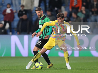 Daniel Maldini of Spezia Calcio competes for the ball with Domenico Berardi of U.S. Sassuolo Calcio during the Serie A match between U.S. Sa...