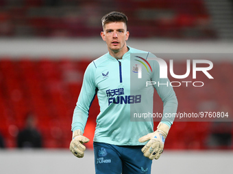 Nick Pope of Newcastle United warms up ahead of kick-off during the Premier League match between Nottingham Forest and Newcastle United at t...